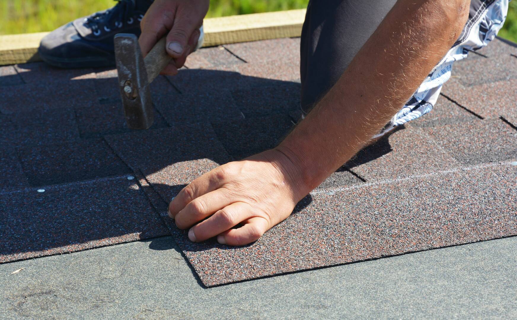 Rowell Roofing logo