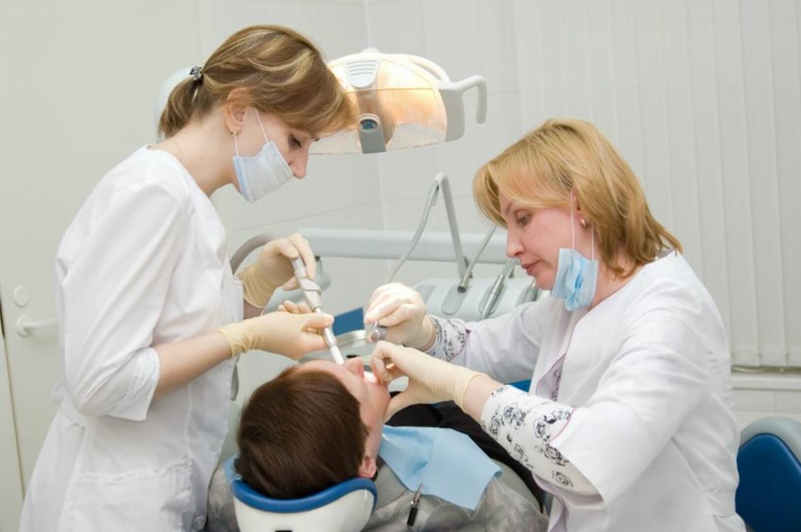Smiles Dental Studios logo
